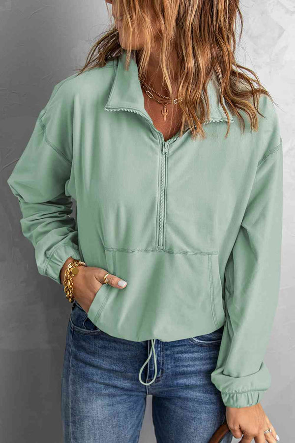 Half-Zip Exposed Seam Drawstring Hem Sweatshirt